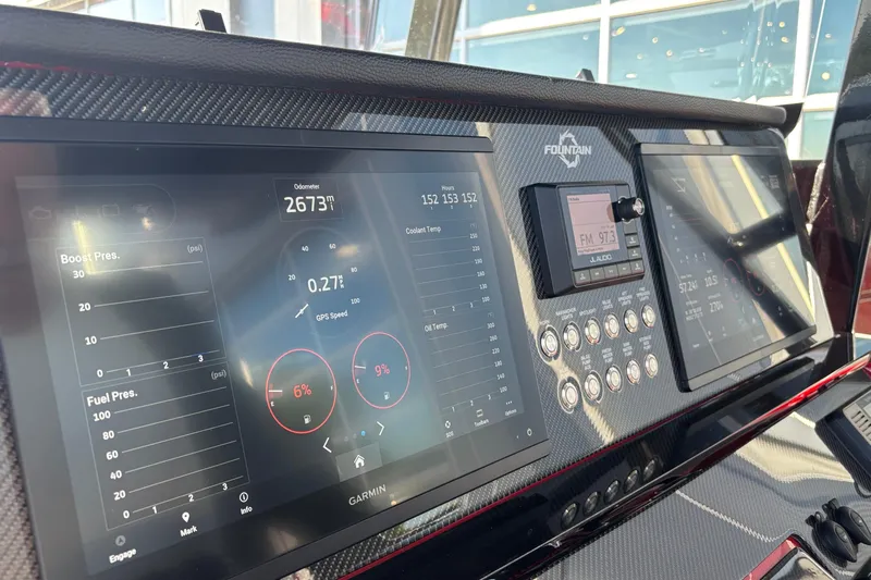  Yacht Photos Pics Dashboard of 2021 Fountain 38 SC boat with digital displays and controls.