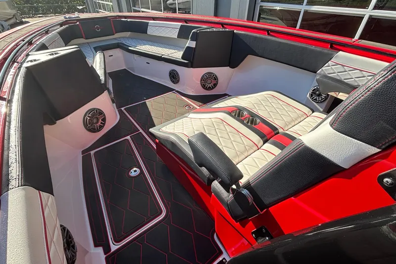  Yacht Photos Pics Luxurious interior of 2021 Fountain 38 SC boat with red and black accents.