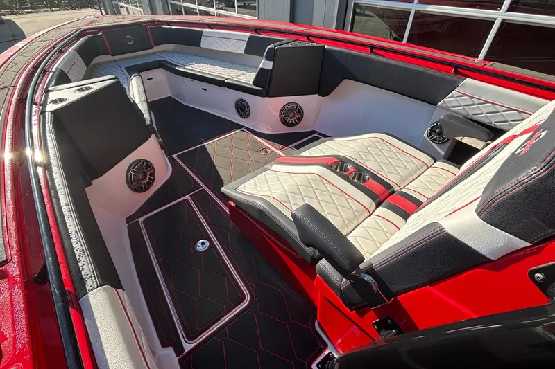  Yacht Photos Pics Luxurious interior of 2021 Fountain 38 SC boat with red and black seating.