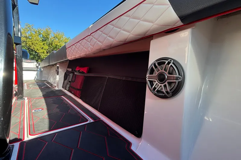  Yacht Photos Pics 2021 Fountain 38 SC boat interior with speaker and quilted seating.