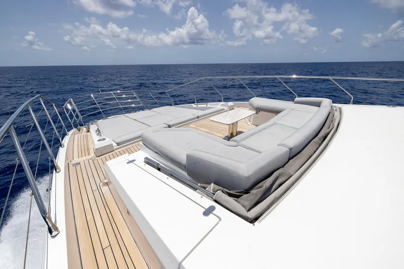  Yacht Photos Pics Luxurious Azimut Grande 27 METRI yacht deck with elegant seating, 2021 model, ocean view.