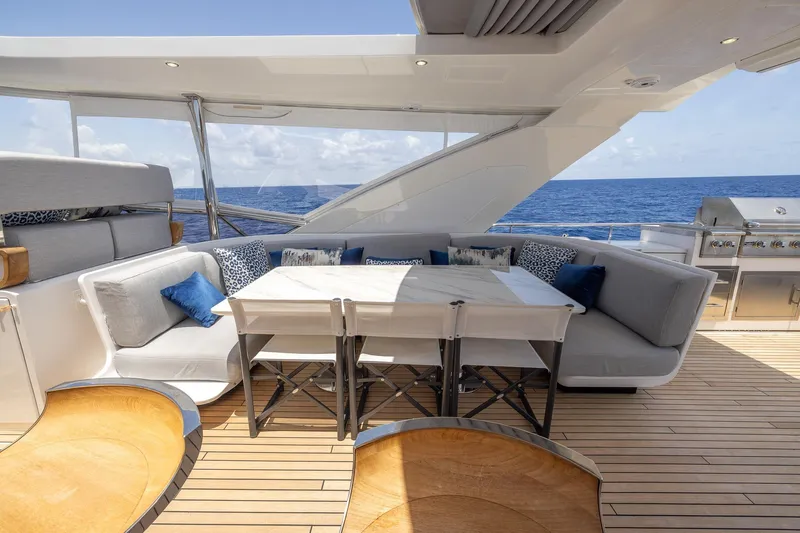  Yacht Photos Pics Luxurious outdoor seating on 2021 Azimut Grande 27 METRI yacht with ocean view.