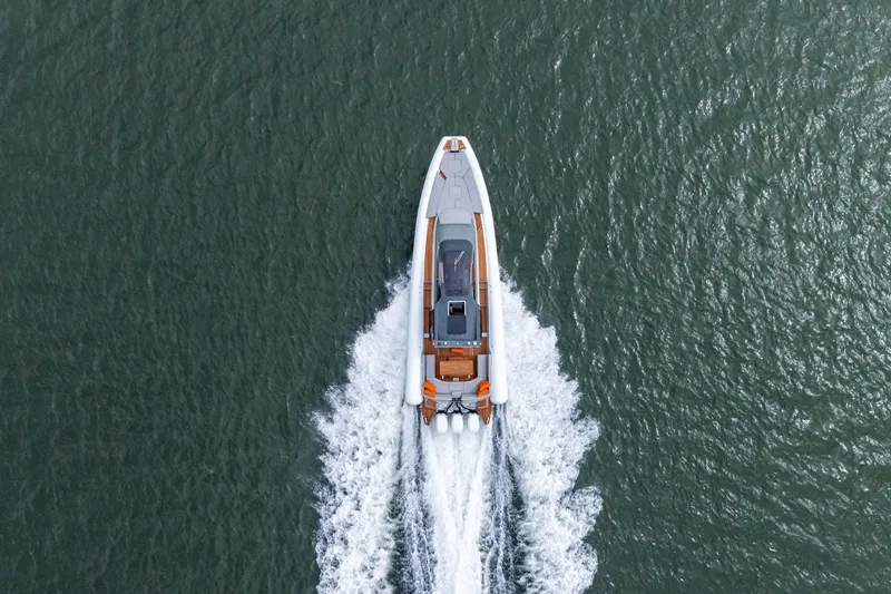  Yacht Photos Pics Aerial view of 2021 Magazzu TARGA 45 boat cruising on water.