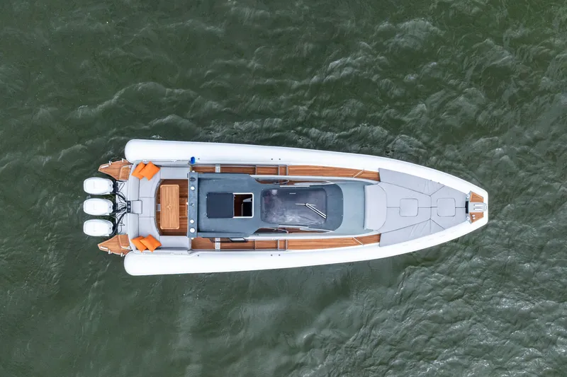  Yacht Photos Pics Aerial view of 2021 Magazzu TARGA 45 boat on water, showcasing sleek design and triple engines.