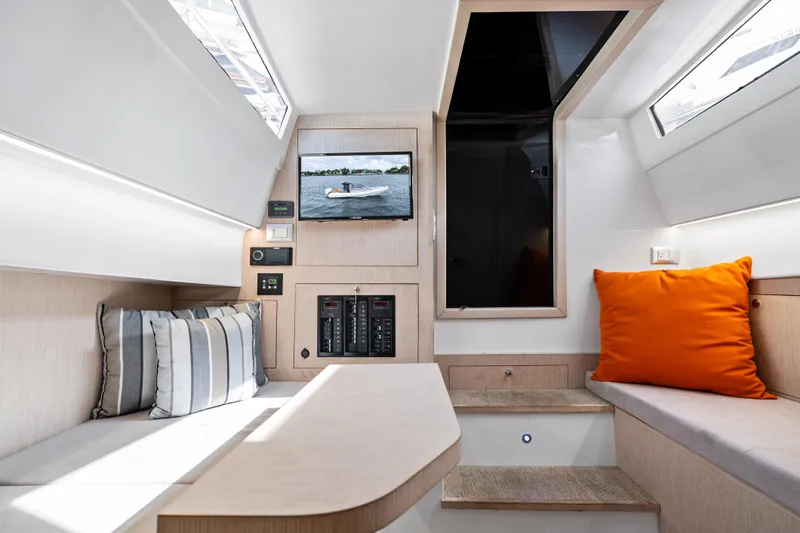  Yacht Photos Pics Interior of 2021 Magazzu TARGA 45 yacht with modern seating and TV.