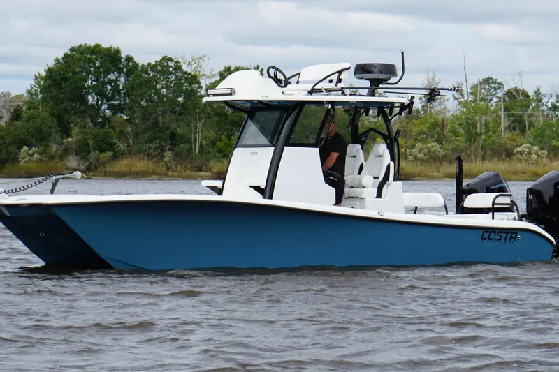  Yacht Photos Pics 2025 Costa Custom Boats 264 HC on water, featuring sleek design and modern amenities.