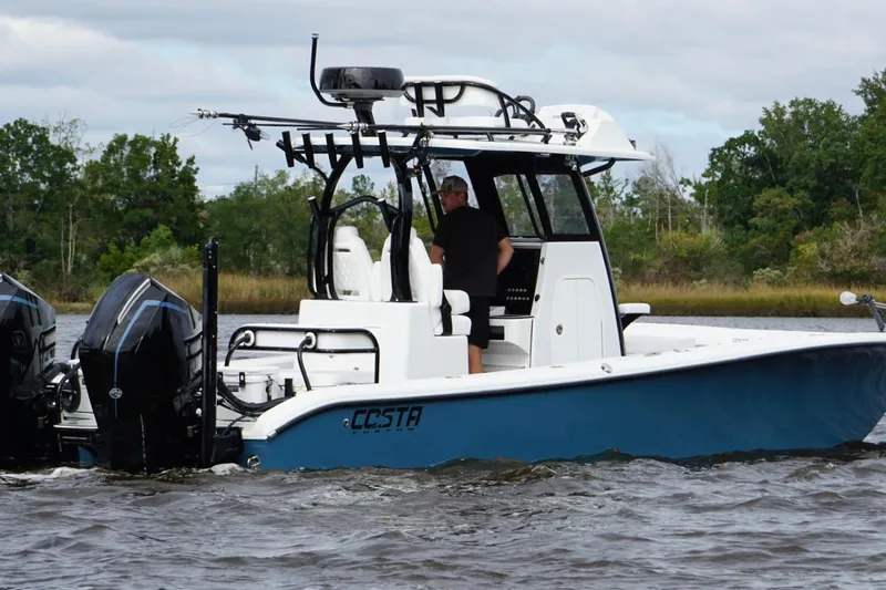  Yacht Photos Pics 2025 Costa Custom Boats 264 HC on water, featuring dual engines and sleek design.