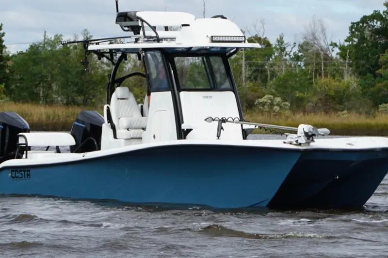  Yacht Photos Pics 2025 Costa Custom Boats 264 HC on water, featuring sleek design and modern amenities.