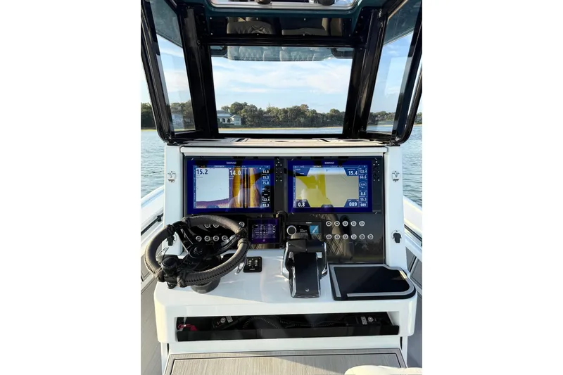  Yacht Photos Pics Helm of 2025 Costa Custom Boats 264 HC with advanced navigation displays and controls.