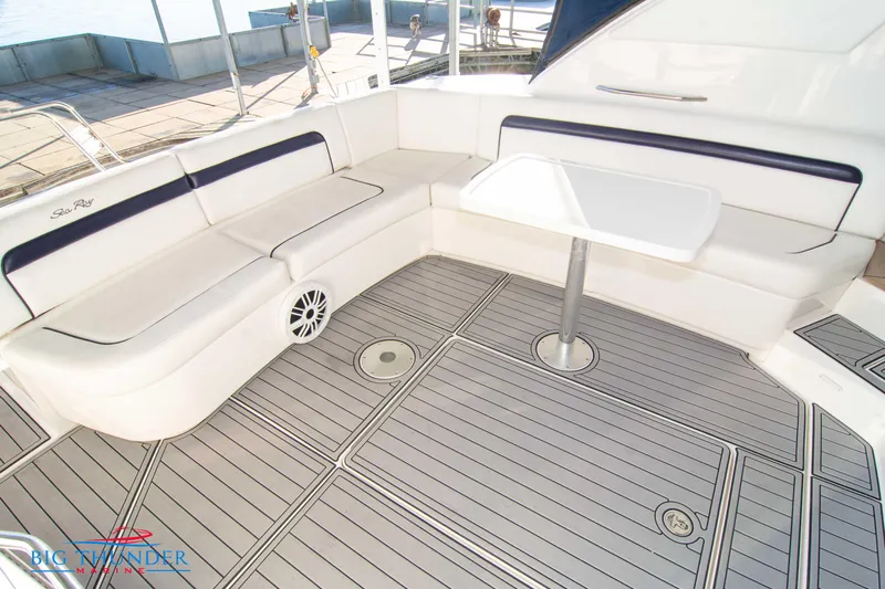  Yacht Photos Pics 2010 Sea Ray 540 Sundancer yacht deck with seating and table, featuring sleek design.