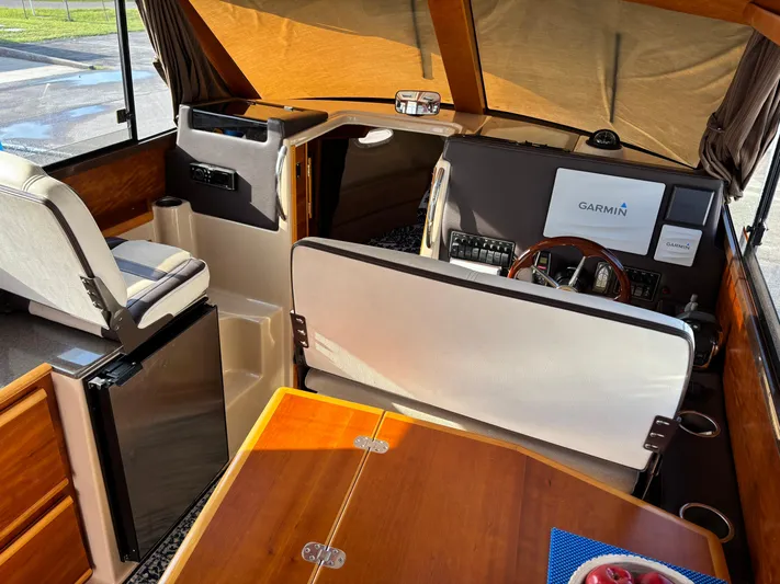 Y Knot Yacht Photos Pics Interior of 2017 Cutwater C-28 Deluxe boat with Garmin navigation system.