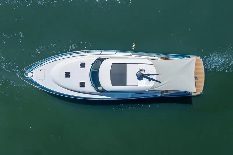 Priceless Yacht Photos Pics Aerial view of 2019 Palm Beach Motor Yachts GT50 on calm water.