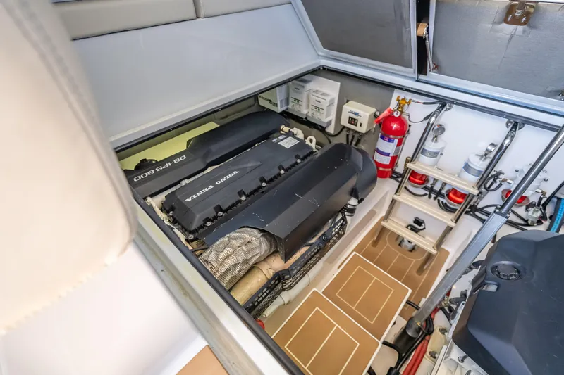 Priceless Yacht Photos Pics Engine room of 2019 Palm Beach Motor Yachts GT50 with Volvo Penta engines and safety equipment.