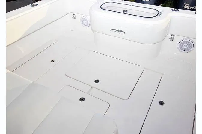  Yacht Photos Pics Manufacturer Provided Image: 2020 Invincible 36 Open Fisherman boat deck with storage compartments and livewell.