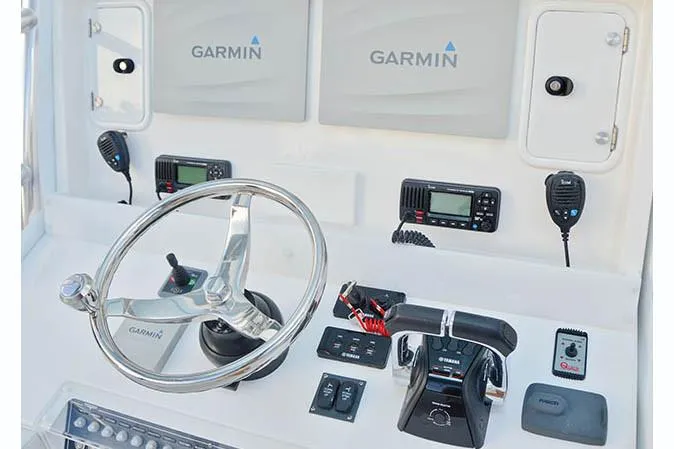 Yacht Photos Pics Manufacturer Provided Image: Invincible 36 Open Fisherman 2020 boat dashboard with Garmin navigation system and controls.