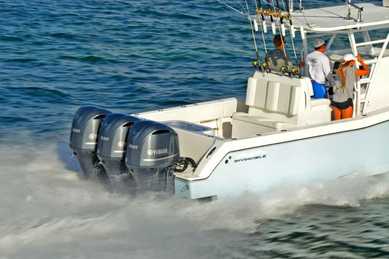  Yacht Photos Pics Manufacturer Provided Image: 2020 Invincible 36 Open Fisherman boat with triple Yamaha engines on water.