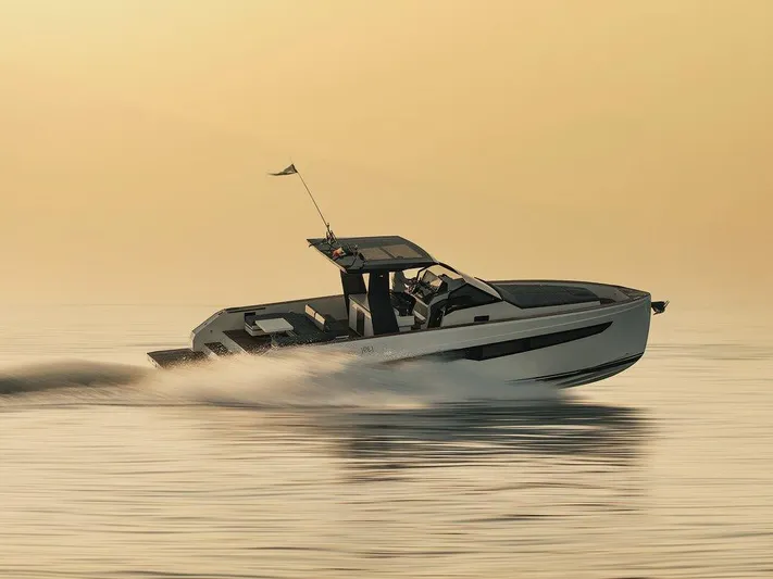 Fiart 43 Yacht Photos Pics 2025 Fiart 43 Seawalker yacht cruising at sunset on calm waters.