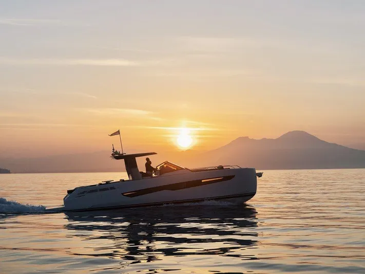 Fiart 43 Yacht Photos Pics 2025 Fiart 43 Seawalker yacht cruising at sunset on calm waters.