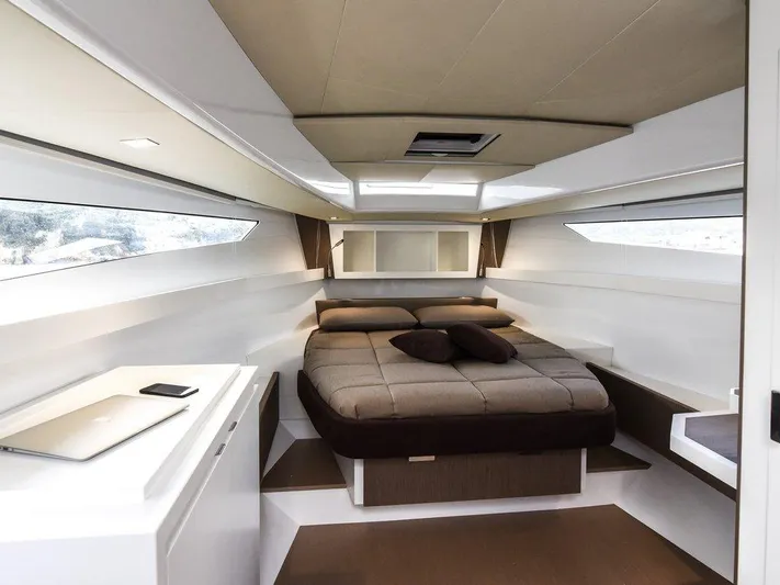Fiart 43 Yacht Photos Pics Luxurious cabin interior of 2025 Fiart 43 Seawalker yacht with modern design and cozy bed.