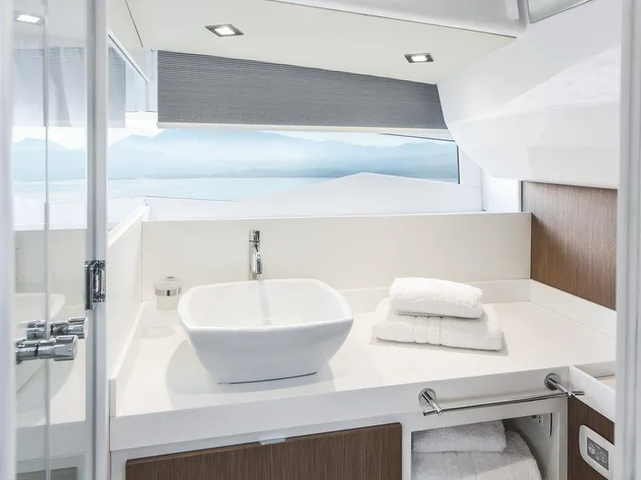 Fiart 43 Yacht Photos Pics Luxurious bathroom interior of 2025 Fiart 43 Seawalker yacht, featuring modern sink and elegant design.
