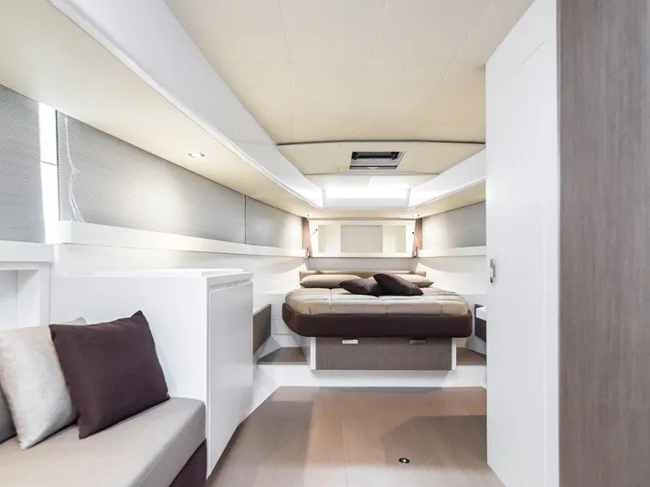 Fiart 43 Yacht Photos Pics Luxurious interior of 2025 Fiart 43 Seawalker yacht with modern design and cozy bedding.