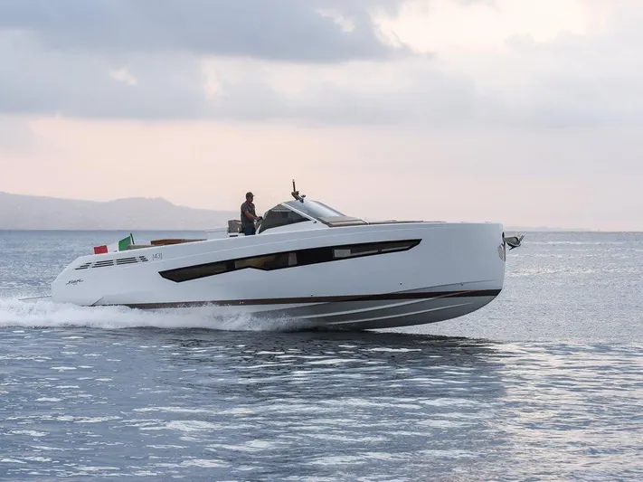 Fiart 43 Yacht Photos Pics 2025 Fiart 43 Seawalker yacht cruising on calm waters at sunset.