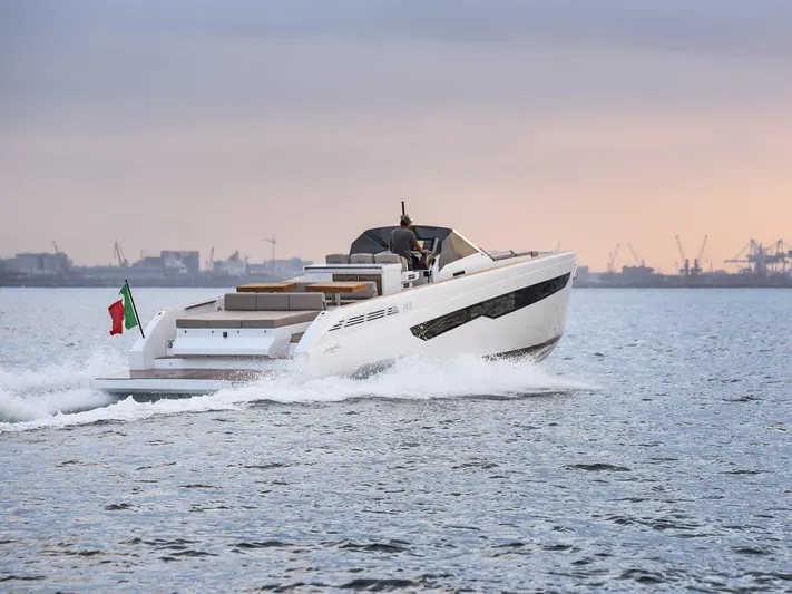 Fiart 43 Yacht Photos Pics 2025 Fiart 43 Seawalker yacht cruising on open water at sunset.