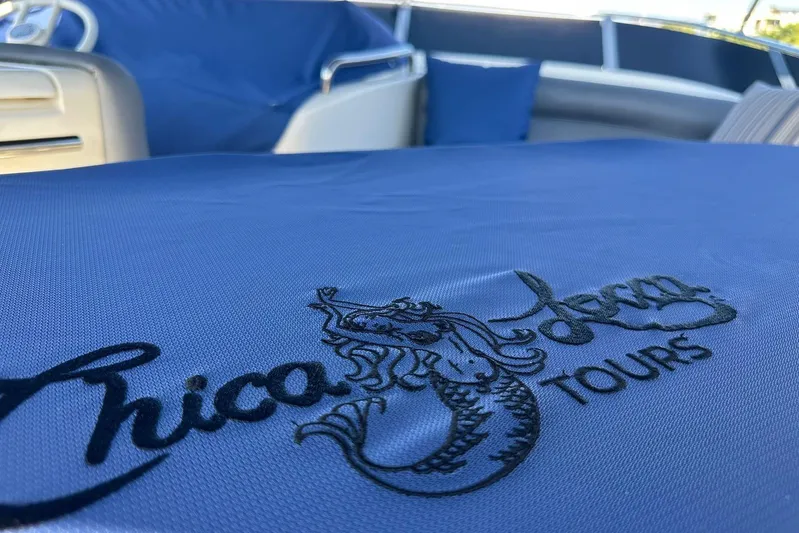 Chica Loca Yacht Photos Pics Blue fabric with "Chica Tours" logo on Azimut 55E yacht, 2003 model.