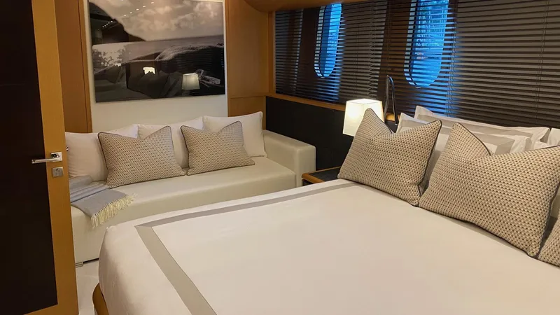 D'one Yacht Photos Pics Luxurious bedroom interior on a 2009 Leopard Yachts model, featuring elegant bedding and decor.