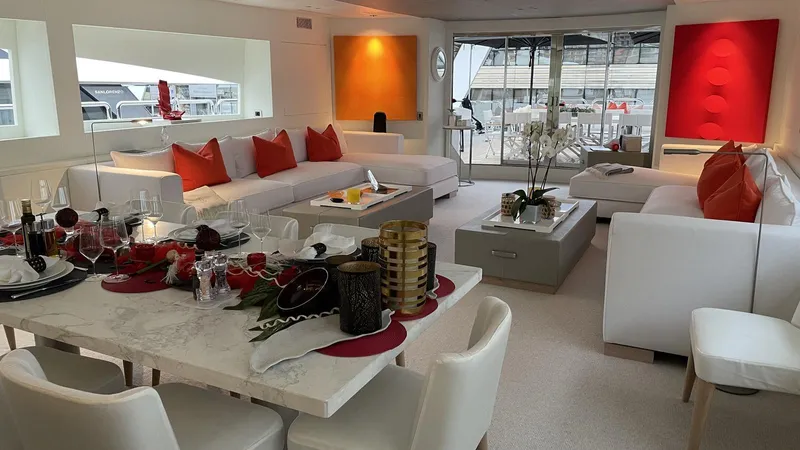 D'one Yacht Photos Pics Luxurious 2009 Leopard Yachts interior with elegant dining and seating areas, featuring modern decor.