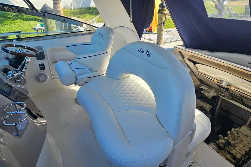 N/a Yacht Photos Pics Luxurious interior of 2004 Sea Ray 380 Sundancer with plush white seating.