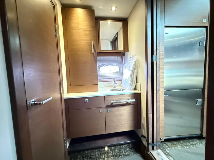 Cabby 13 Yacht Photos Pics 2013 Sea Ray 470 Sundancer interior with modern cabinetry and stainless steel appliances.