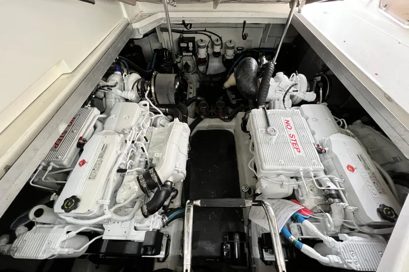 Cabby 13 Yacht Photos Pics Engine room of 2013 Sea Ray 470 Sundancer with twin engines and labeled components.