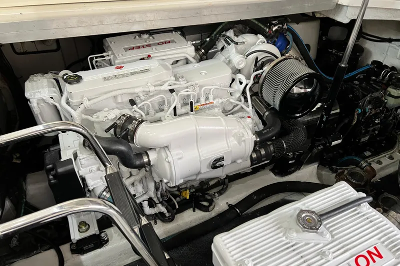 Cabby 13 Yacht Photos Pics Engine compartment of a 2013 Sea Ray 470 Sundancer, showcasing a clean, well-maintained engine.