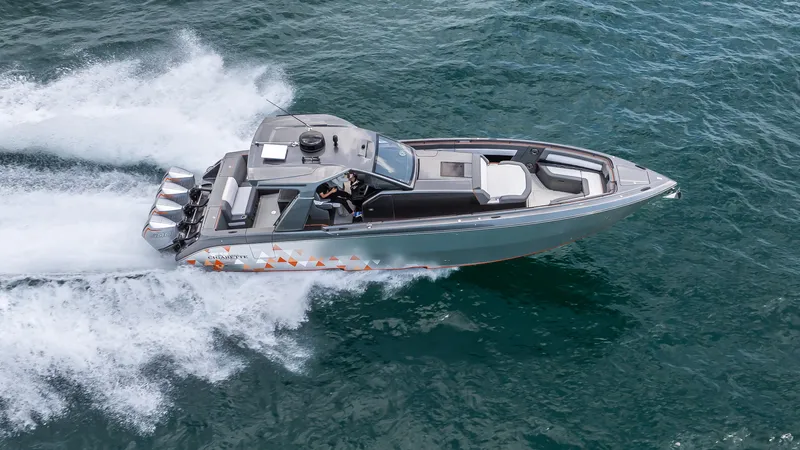  Yacht Photos Pics 2025 Cigarette 42 Auroris speedboat cruising on open water.