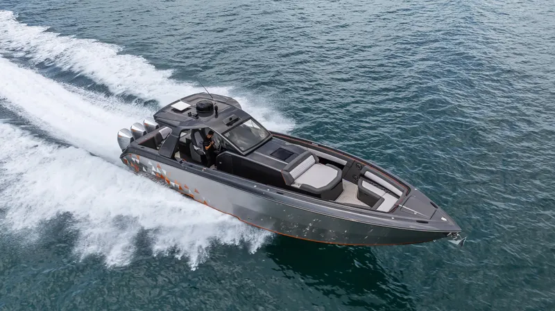  Yacht Photos Pics 2025 Cigarette 42 Auroris speedboat cruising on open water.