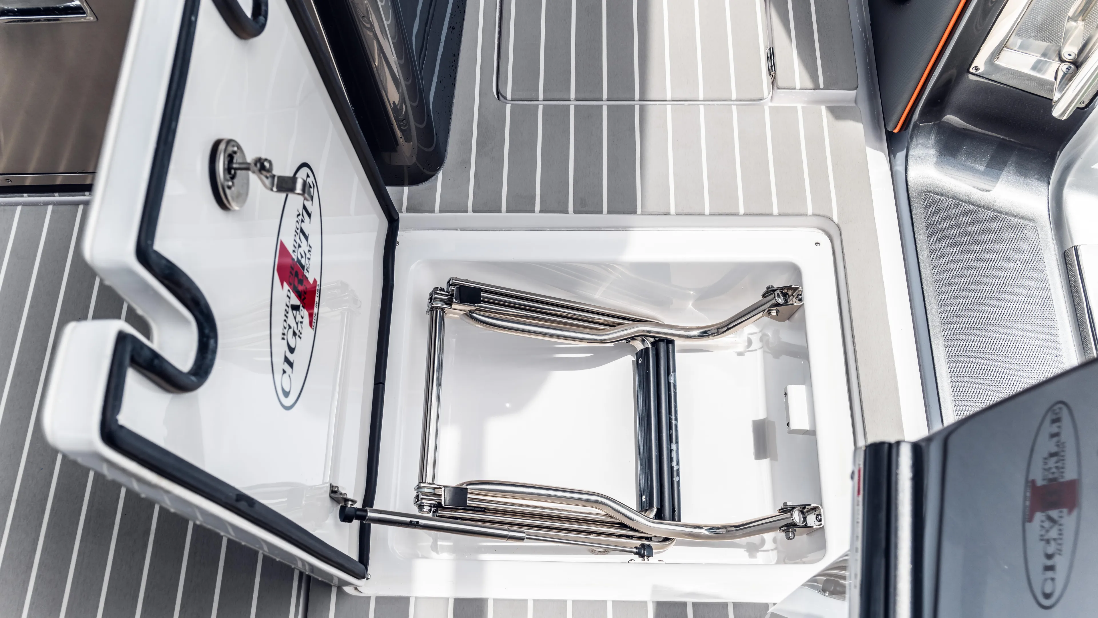  Yacht Photos Pics Open hatch on 2025 Cigarette 42 Auroris boat, revealing storage compartment.