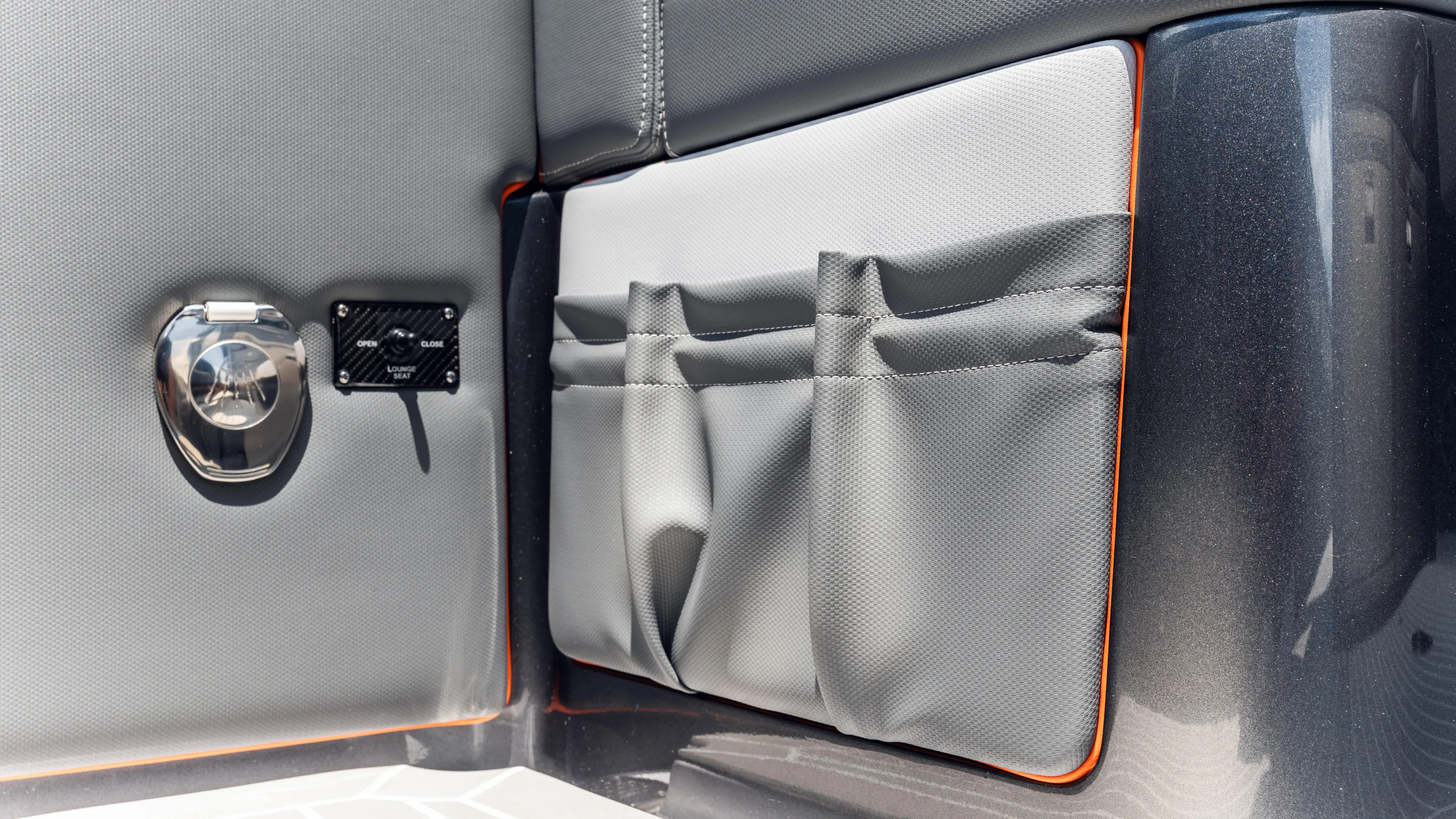  Yacht Photos Pics Interior detail of 2025 Cigarette 42 Auroris boat, featuring storage pockets and sleek design.