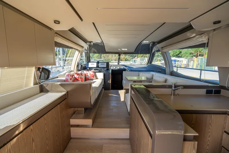 Dudu Yacht Photos Pics Luxurious interior of 2021 Ferretti Yachts 550, featuring modern design and spacious layout.