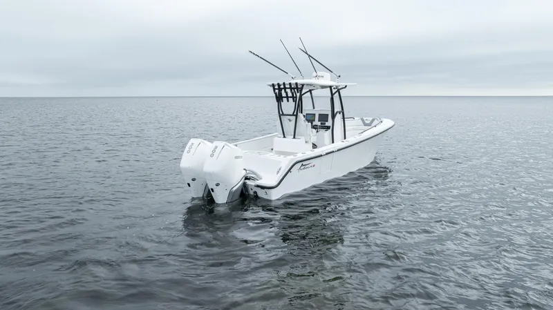  Yacht Photos Pics 2024 Streamline 26 CC boat on open water, featuring dual engines and sleek design.