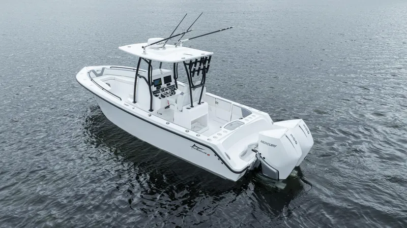  Yacht Photos Pics 2024 Streamline 26 CC boat on calm water, featuring a sleek design and powerful outboard motor.