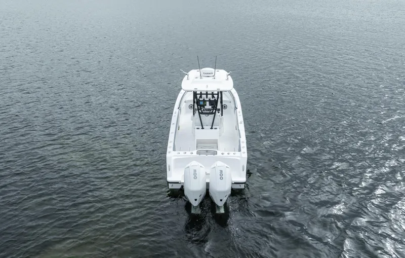  Yacht Photos Pics 2024 Streamline 26 CC boat on calm water, rear view with dual engines.