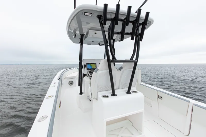  Yacht Photos Pics 2024 Streamline 26 CC boat on open water, featuring sleek design and modern console.