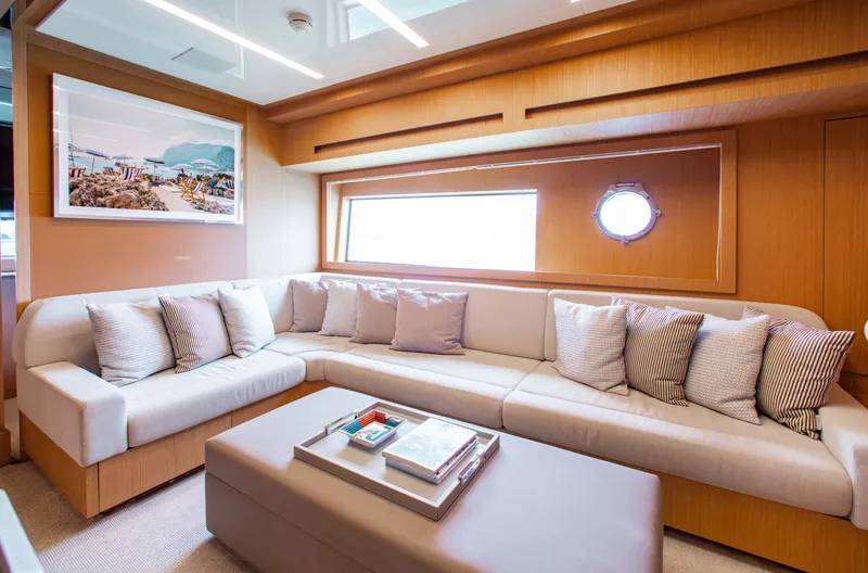 Lady Elkie Yacht Photos Pics Luxurious interior of 2016 Riva 88' Florida yacht with elegant seating and decor.