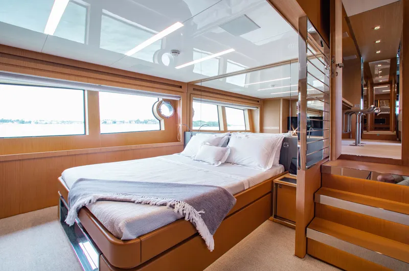 Lady Elkie Yacht Photos Pics Luxurious bedroom interior of 2016 Riva 88' Florida yacht with modern design.