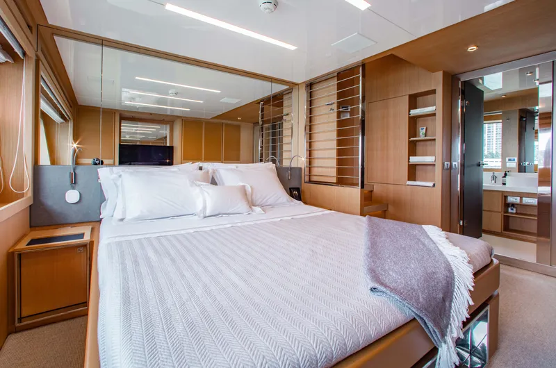 Lady Elkie Yacht Photos Pics Luxurious bedroom interior of 2016 Riva 88' Florida yacht with modern design.