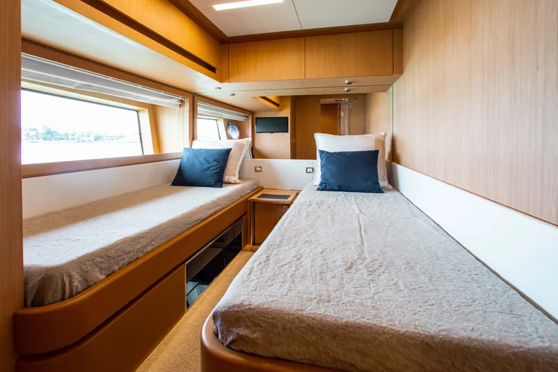 Lady Elkie Yacht Photos Pics Interior of 2016 Riva 88' Florida yacht with twin beds and modern design.