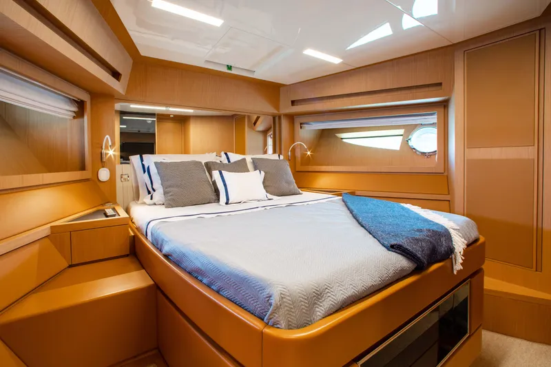 Lady Elkie Yacht Photos Pics Luxurious bedroom interior of 2016 Riva 88' Florida yacht with modern design.