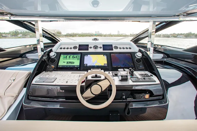 Lady Elkie Yacht Photos Pics Cockpit of 2016 Riva 88' Florida yacht with advanced navigation systems and controls.