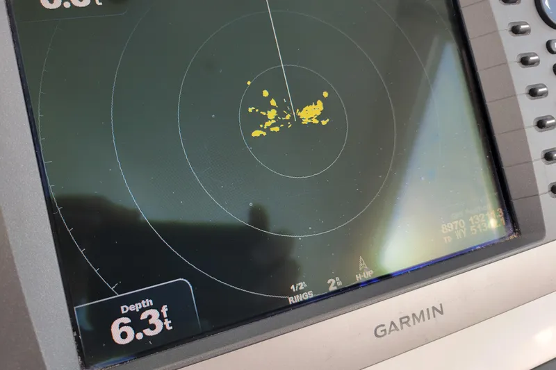 Reely Blessed Yacht Photos Pics Garmin marine radar display showing depth of 6.3 feet on Cabo 31 Express, 1998 model.